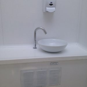 Interior running sink of a Luxury Portable Restroom for Moon Portable Restrooms.