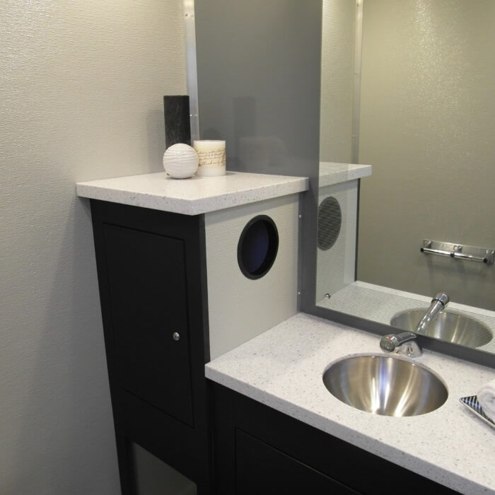 Moon Portable Restrooms Porta Lisa Interior Sink and waste receptacle.