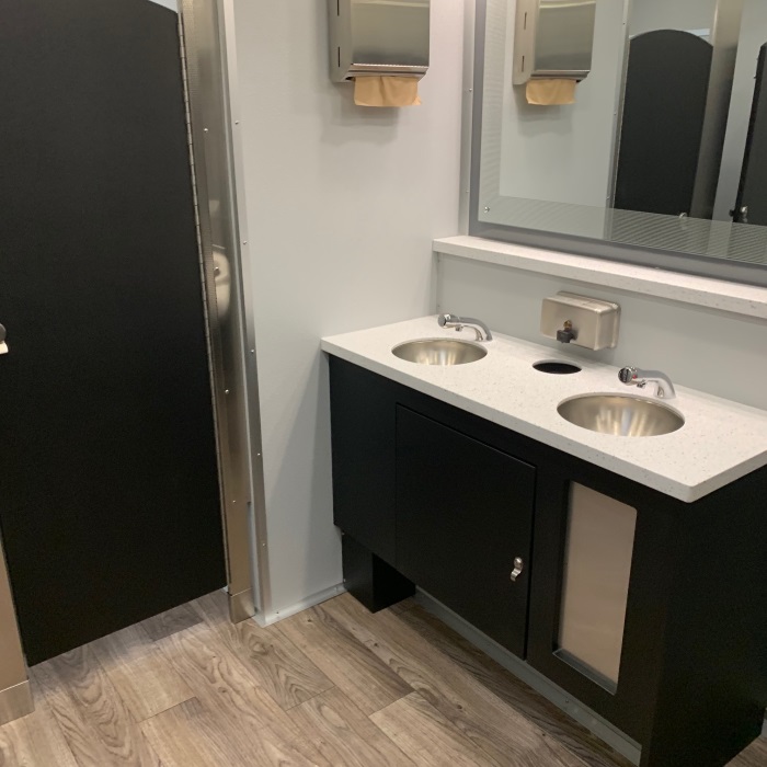 Interior view of flushable Portable Restrooms in Louisville KY for rent.