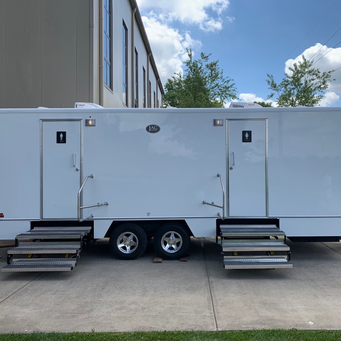 Front view of a 2 person porta-potty